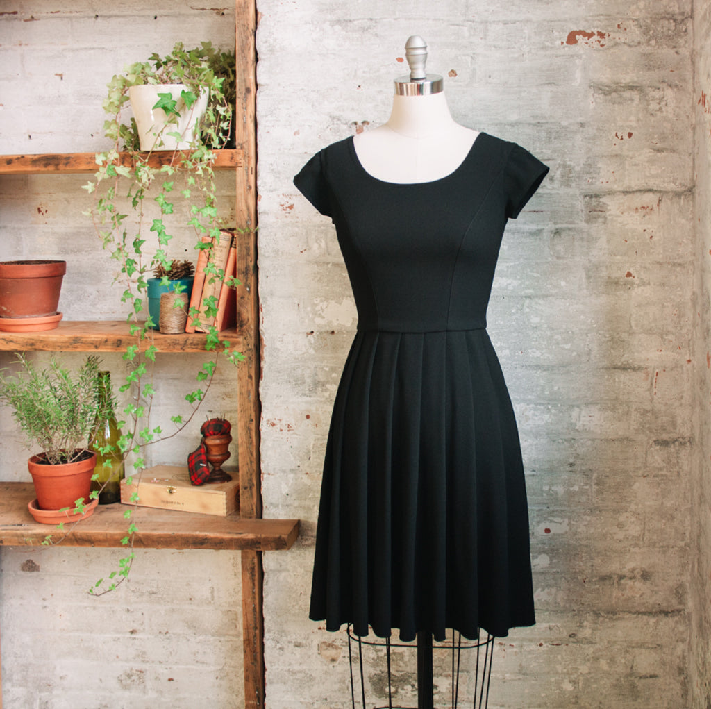 Knee Length Black Pleated Dress with Short Sleeves by Jessica Rose