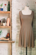 Marion long sleeve tan babydoll dress for women with square neck and simple flowy silhouette.