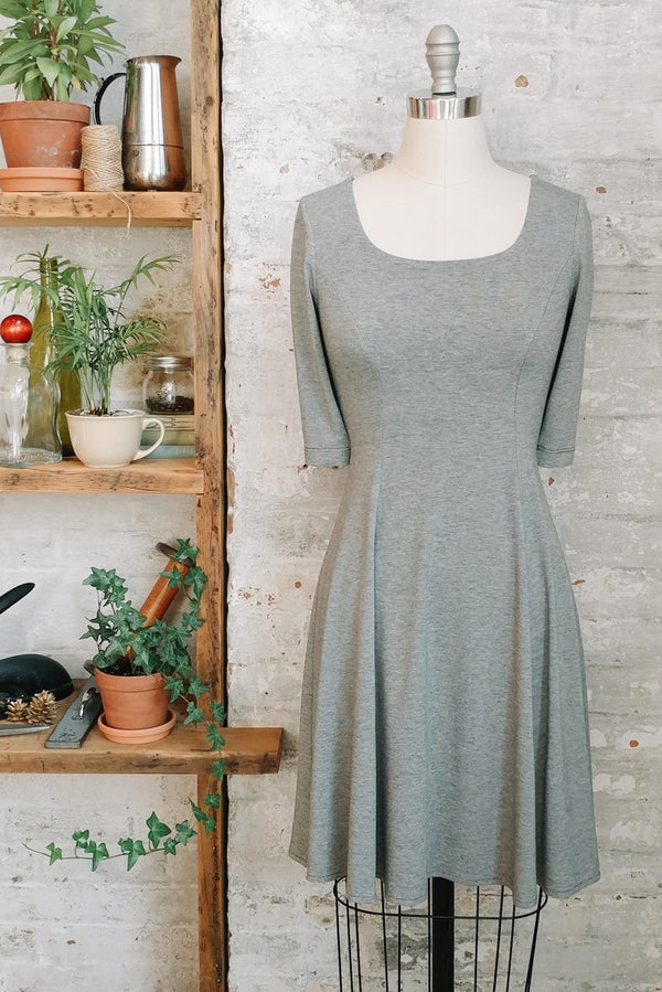 Women's knee length heathered grey fit and flare dress with sleeves and scoop neck